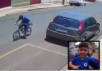 Corpo de menino que estava desaparecido foi achado a cerca de 1km de local onde v�tima foi flagrada por c�mera andando de bicicleta