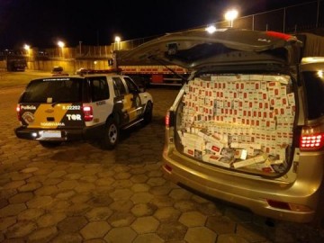 Transportados em ve�culos roubado e dubl�, 30 mil ma�os de cigarros