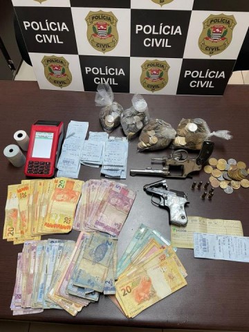 Comerciante � detido em Rin�polis com armas de fogo, dinheiro e materiais do jogo de bicho