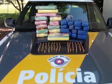 Motorista tenta passar pela pol�cia com crack, coca�na e muni��es